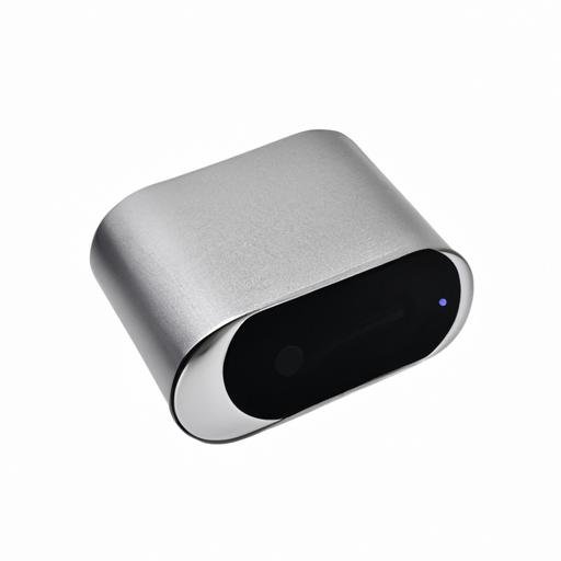 Loa trung hiện đại màu bạc và đen kết nối Bluetooth đặt trên nền trắng.